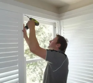 Complete Blinds Worker Installing
