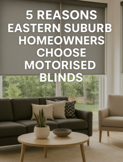 Modern living room with motorised blinds on large windows in a Melbourne home.