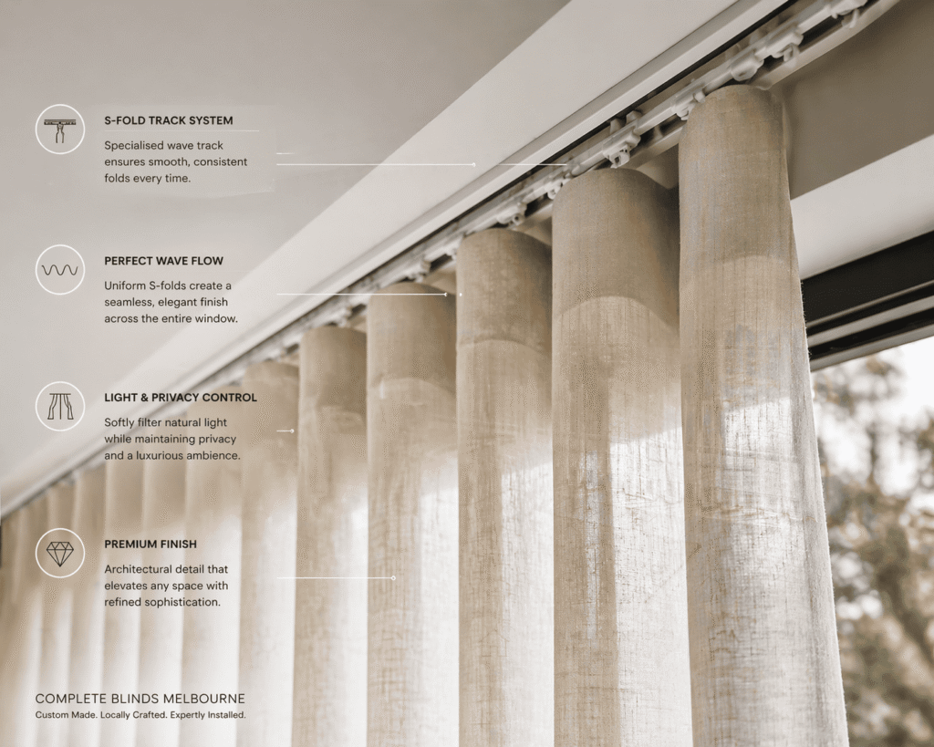 Close-up of S-Fold curtain track system showing smooth fabric flow